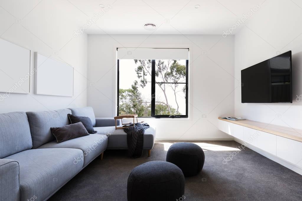 Mounted flat-screen TV in a living room