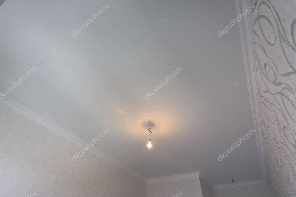 Ceiling after drywall patch and paint with no visible stain