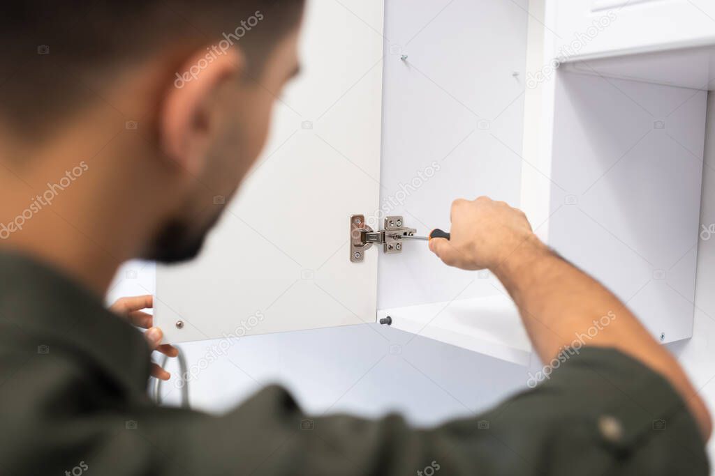 Interior door closing smoothly after hinge and latch adjustment